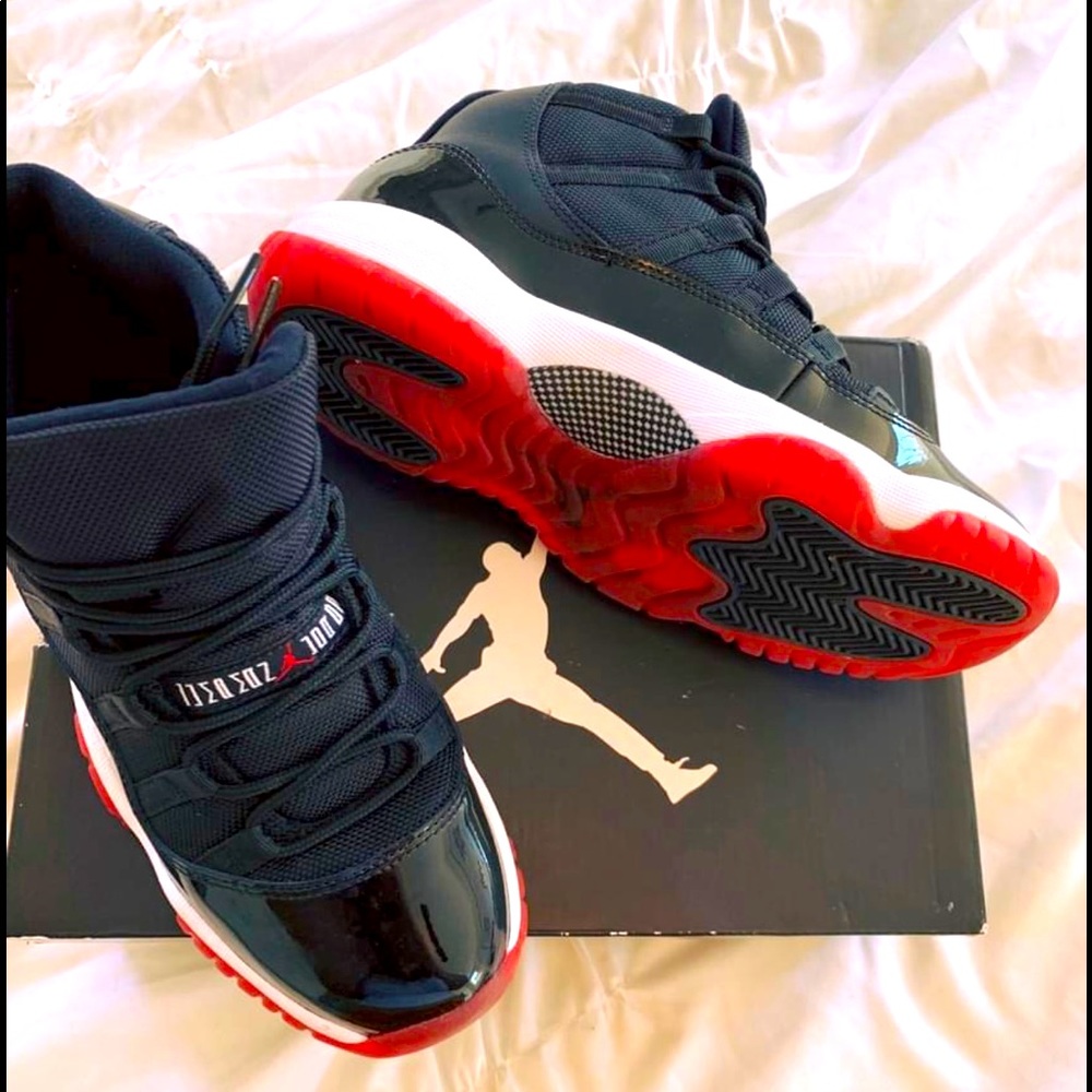 Authentic Air Jordan Bred 11’s, size 7 in womens, 5 youth.